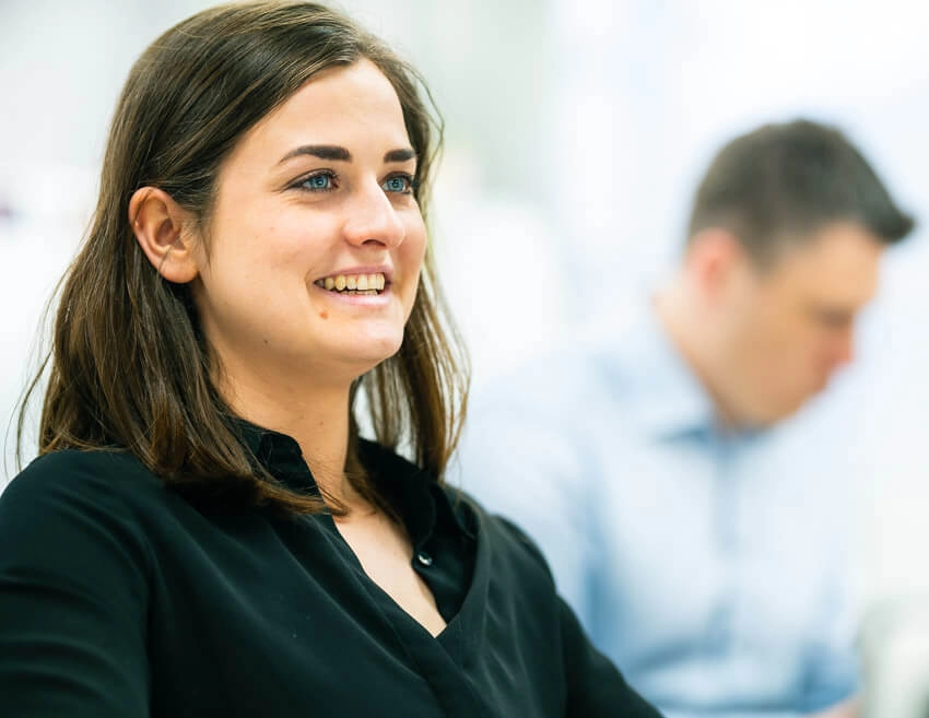 A woman with a happy, smiling face.