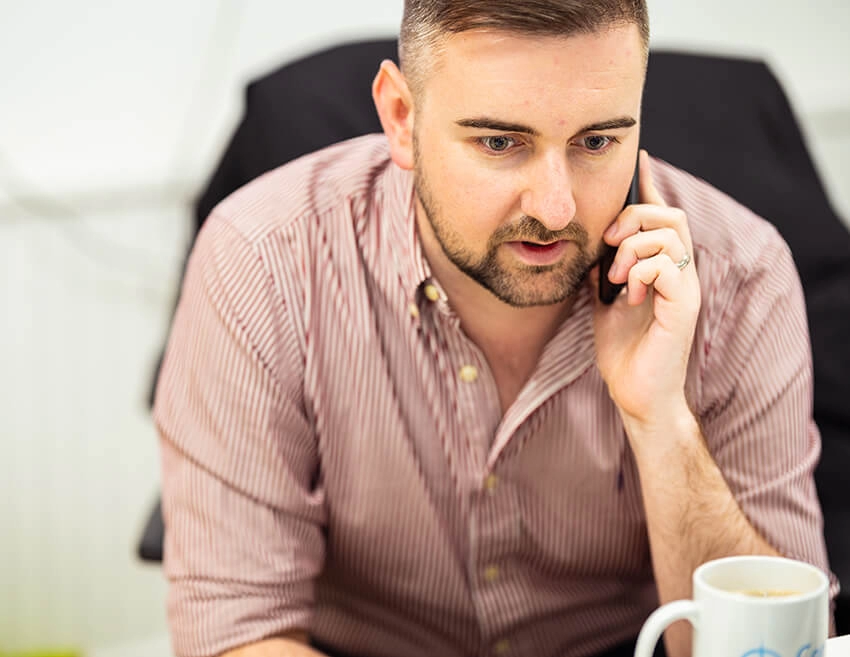 A man on a phone call.