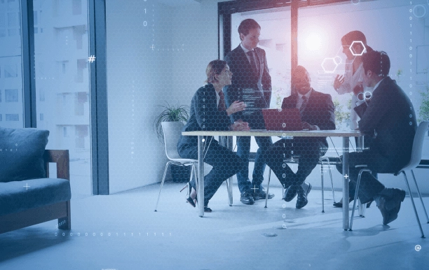 Digital transformation - people holding a meeting in a modern office.