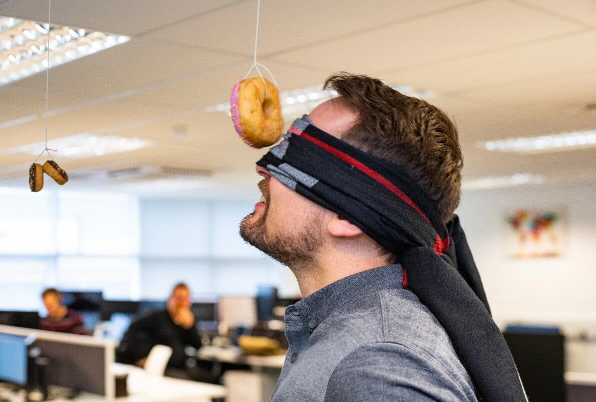 Juraj blindfolded for the Doughnut Dangle.