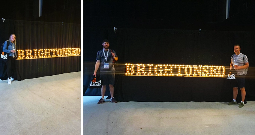 BrightonSEO sign lit up in the auditorium.