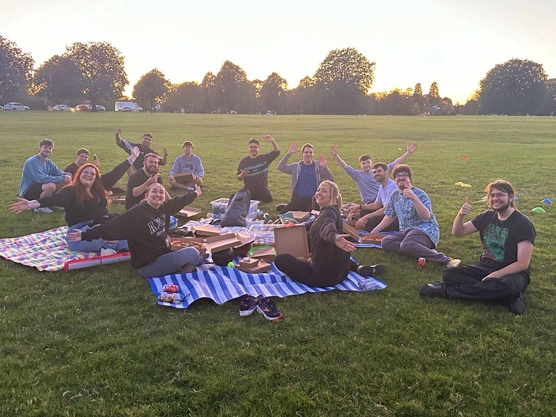 Digital Team having a sunset picnic