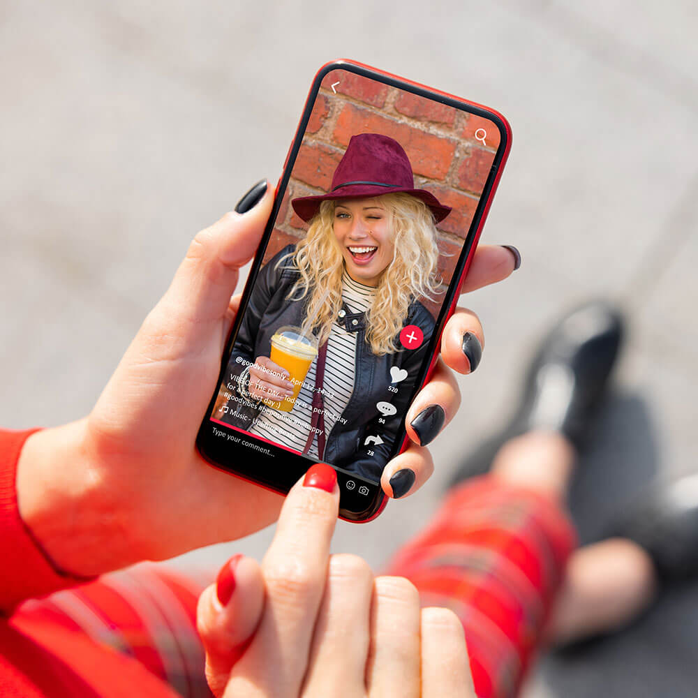 Researching industry trends - woman on mobile device